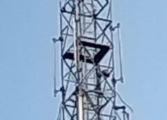 man climbing tower