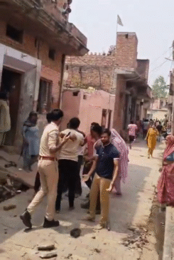 Two parties clashed over hitting a dog with a stick