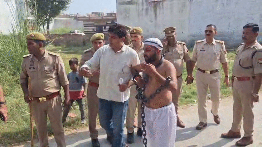 A young man in chains arrived at Imran Masood's home