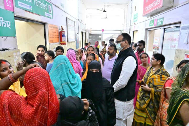Deputy CM Brajesh Pathak stands in line as a patient at the Chinhat CHC in Lucknow.