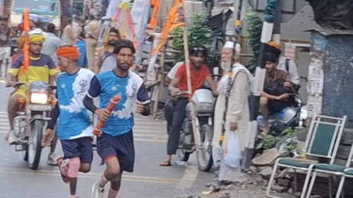 After the padayatra it's now the turn of the dak kanwad, Shiva devotees racing on the roads with bikes and cars.