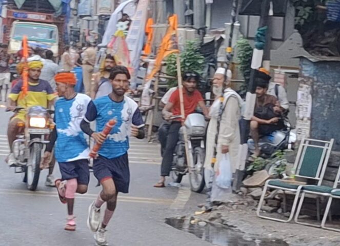 After the padayatra it's now the turn of the dak kanwad, Shiva devotees racing on the roads with bikes and cars.