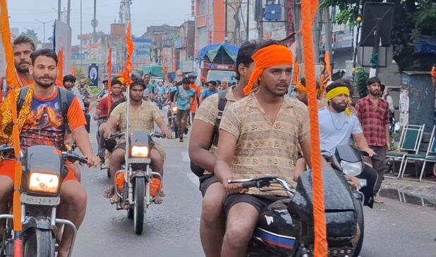 After the padayatra it's now the turn of the dak kanwad, Shiva devotees racing on the roads with bikes and cars.