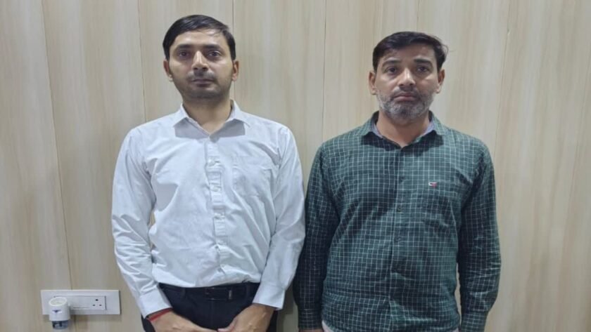 Mining officer and clerk arrested